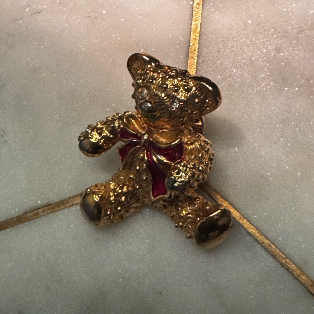 Gold Teddy Bear Brooch with Red Bow
